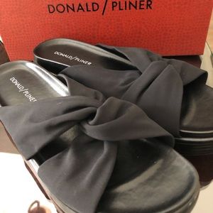 Brand new Donald Pliner black wedge sandal.